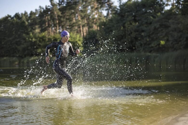 Sportive girl runs on the water