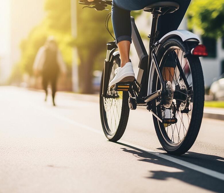 A person zipping through a dedicated bike lane on a stylish elec